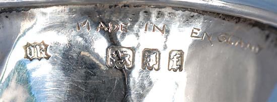 A George V Arts & Crafts planished silver waisted napkin ring, by Omar Ramsden, Height 58mm weight 1.3oz/43grms